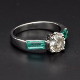 Special Cut Mossanite and Columbian Emerald Ring in 18k White Gold.