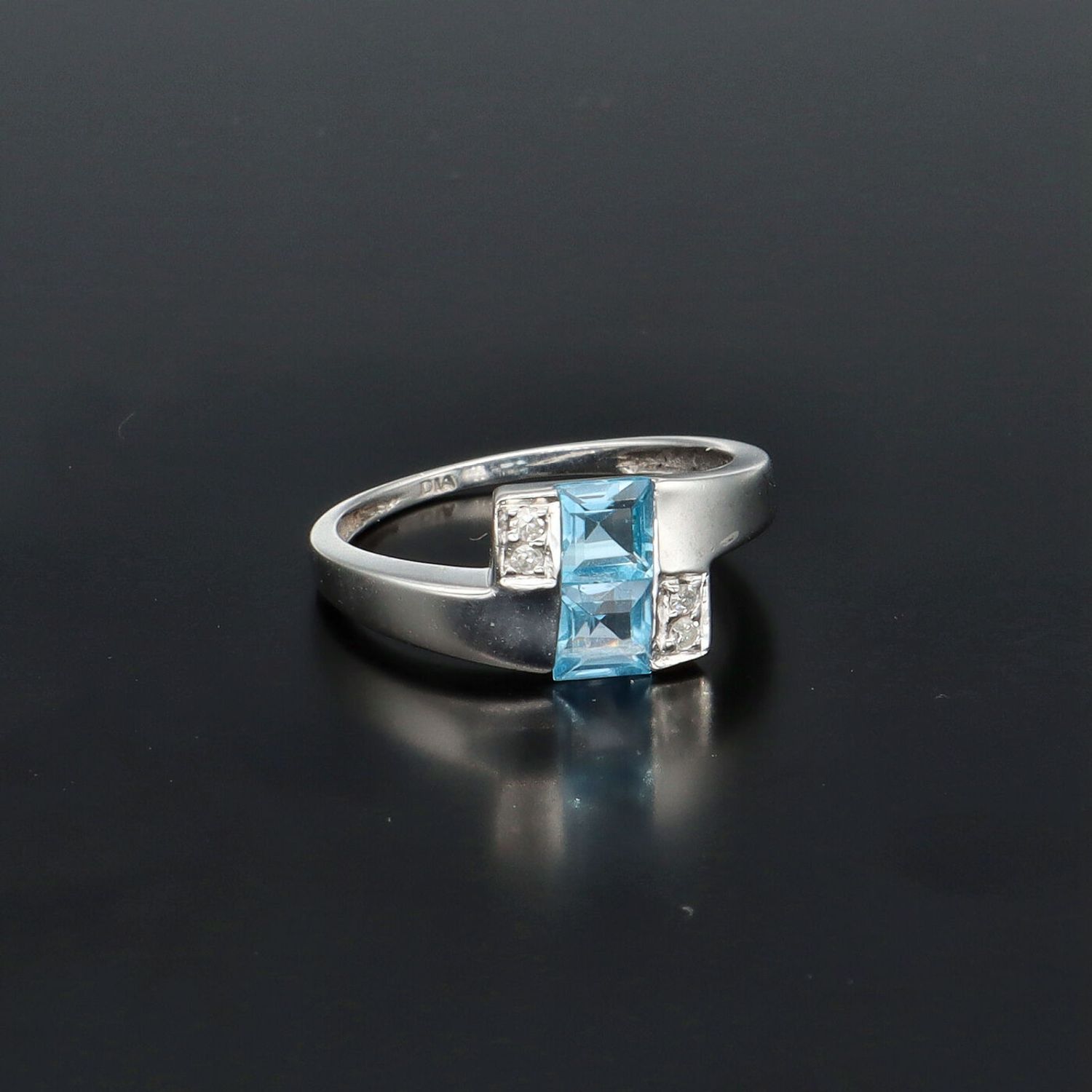 Square blue hot sale topaz ring