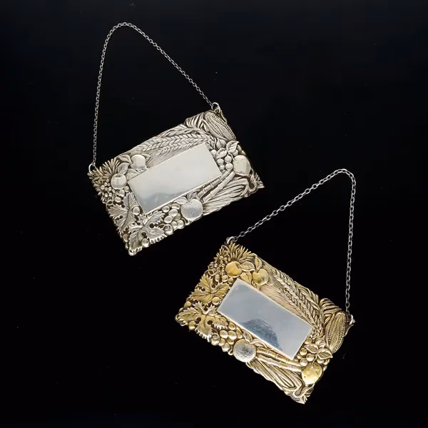 Matched Pair of Elizabeth II Silver and Silver Gilt Wine Labels