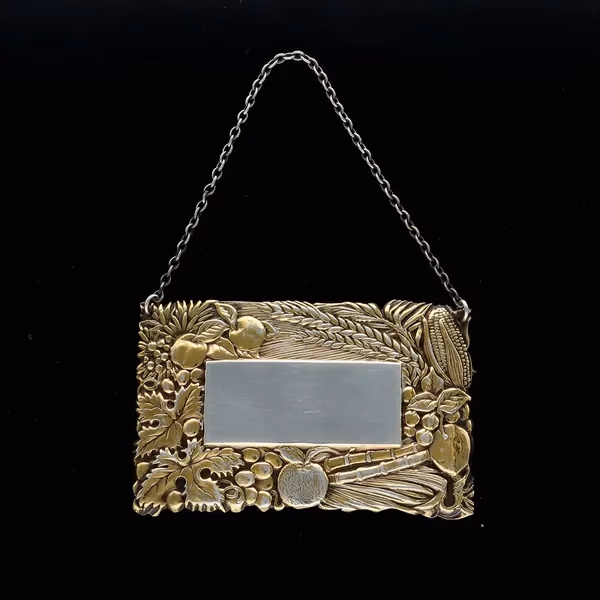 Matched Pair of Elizabeth II Silver and Silver Gilt Wine Labels
