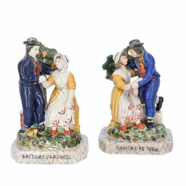 Pair Of Staffordshire Pottery Figurines