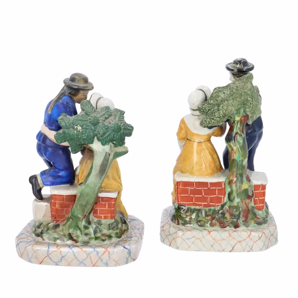 Pair Of Staffordshire Pottery Figurines