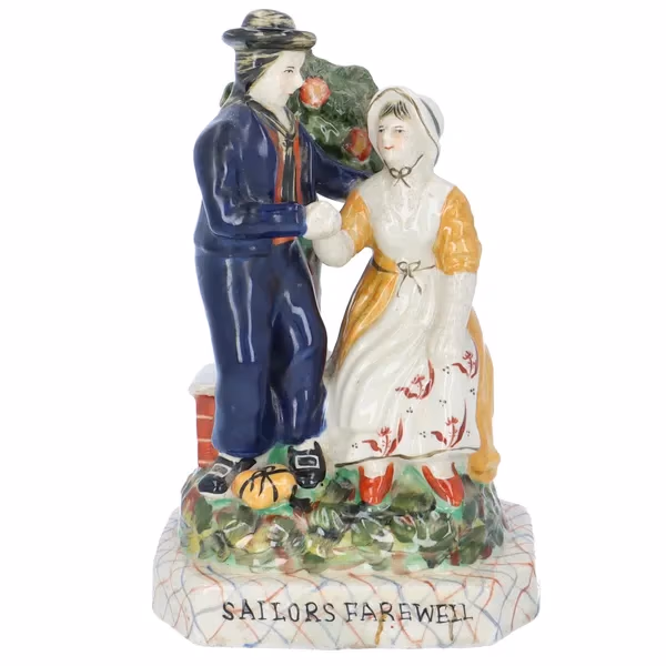 Pair Of Staffordshire Pottery Figurines