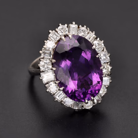 18ct White Gold Large Oval Cut Sapphire With Mixed Cut Diamond Halo