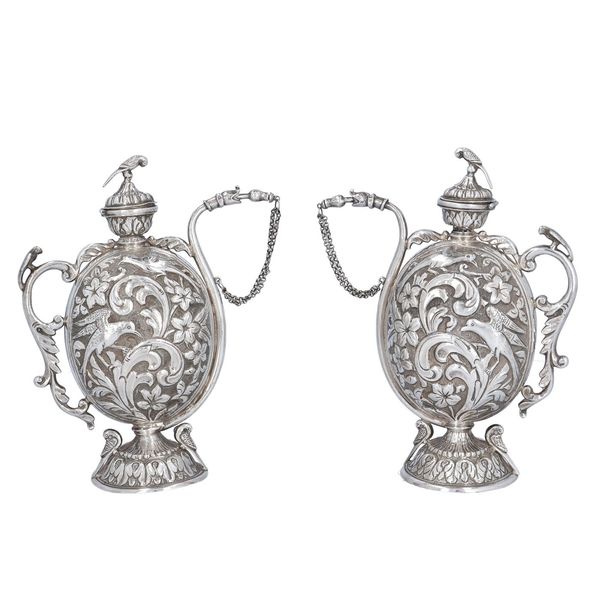 Very Rare Pair of Silver Chuskis Jugs