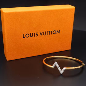 Louis Vuitton 18ct Gold & Diamond LV Volt Upside Down Bangle