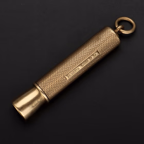 9ct Yellow Gold Cigar Piercer With Engine Turned Body