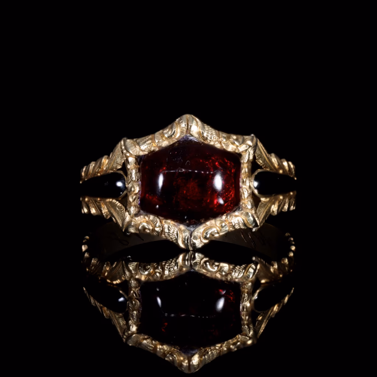 360° view of The Antique Georgian 1820 Garnet Cabochon Foliate Mourning Ring