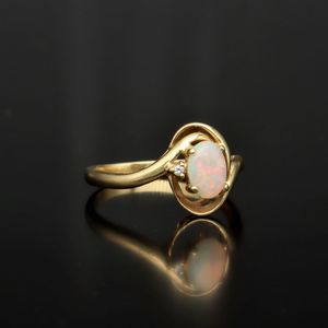 18ct Gold Opal and Diamond Ring