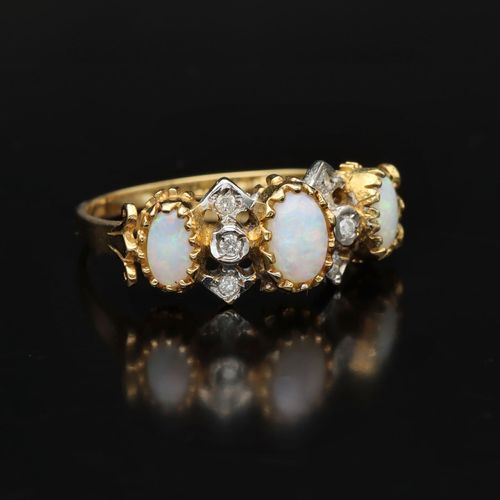 18ct Hand Made Opal and Diamond Ring image-1