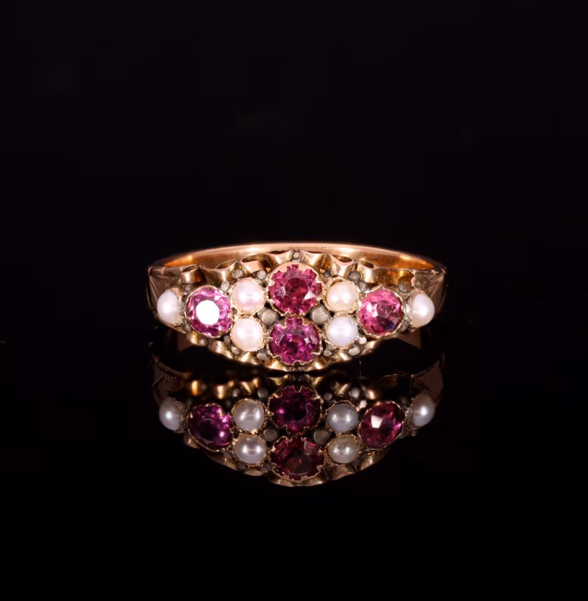 360° view of The Antique Victorian 1875 Almandine Garnet and Seed Pearl Ring