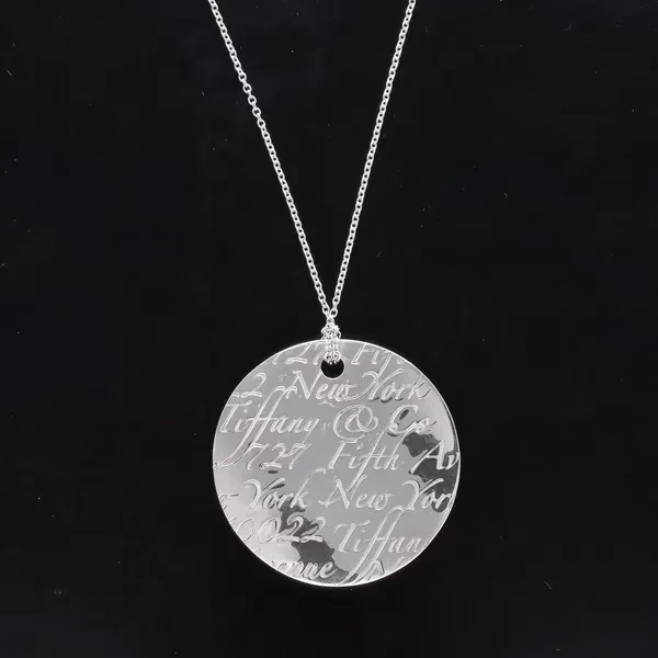 Tiffany and Co Silver New York Notes Pendant