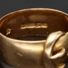 18ct Gold Diamond and Ruby Buckle Ring