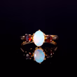360° view of The Vintage 1982 Opal And Garnet 3 Stone Ring