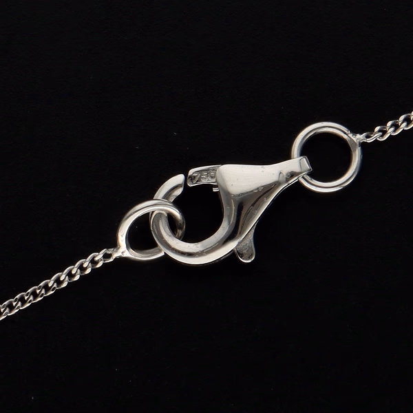 18ct White Gold Tanzanite and Diamond Pendant