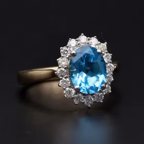 9ct Gold Diamond and Blue Topaz Ring