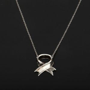 Tiffany and Co Silver Ribbon Pendant Necklace