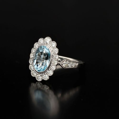 9ct Gold Diamond and Blue Topaz Ring image-3