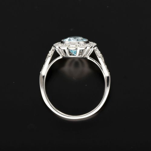 9ct Gold Diamond and Blue Topaz Ring image-6
