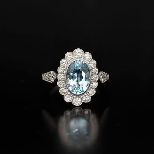 9ct Gold Diamond and Blue Topaz Ring image-2
