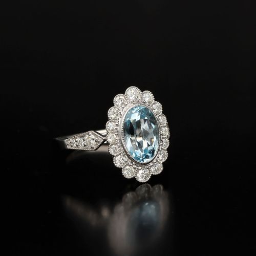 9ct Gold Diamond and Blue Topaz Ring image-1