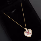 9ct Gold Diamond and Ruby Heart Pendant
