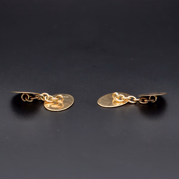 Pair Of 18ct Yellow Gold Engine Turned Cufflinks