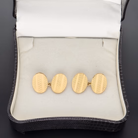 Pair Of 18ct Yellow Gold Engine Turned Cufflinks