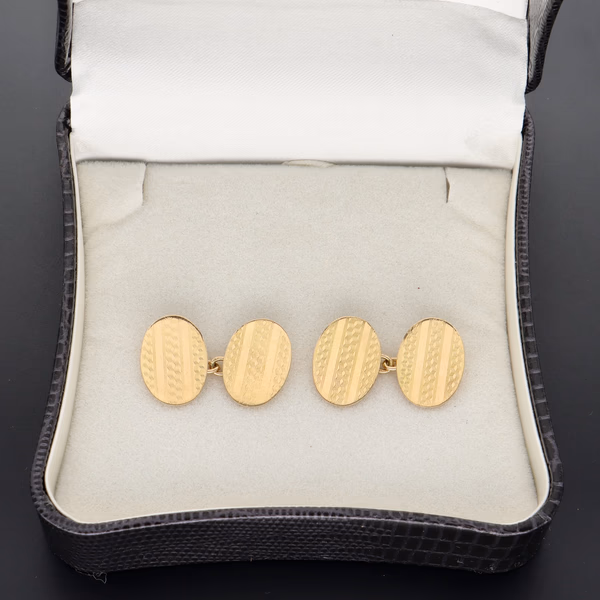 Pair Of 18ct Yellow Gold Engine Turned Cufflinks