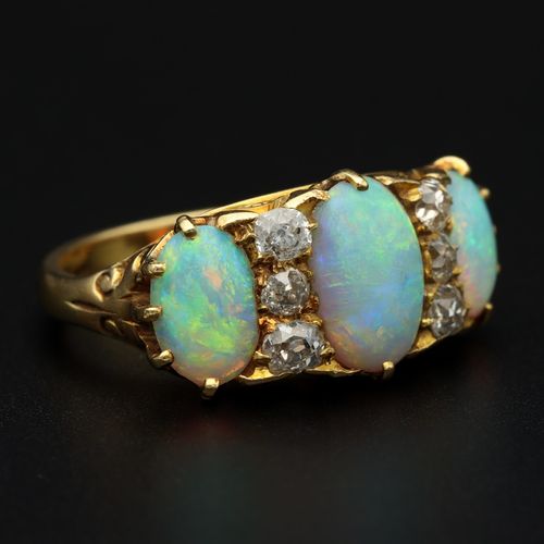 18ct Gold Opal & Diamond Ring image-1