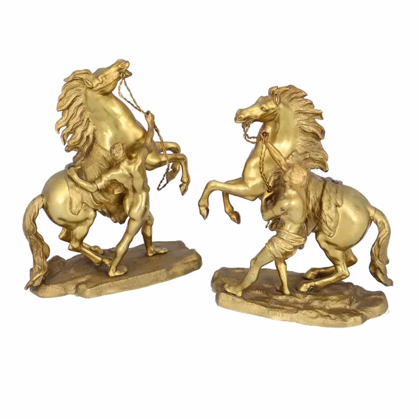 A Par Of French Gilt Metal Marly Horses