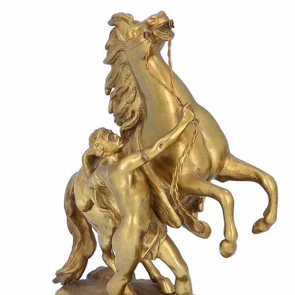 A Par Of French Gilt Metal Marly Horses