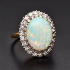Large Oval Opal & Diamond Halo Ring