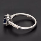18ct White Gold Oval Sapphire & Diamond Halo Ring