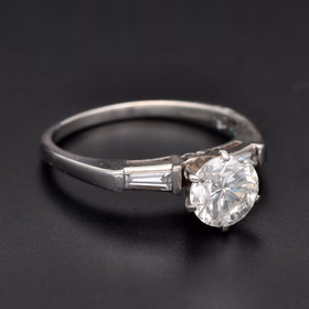 18ct White Gold Diamond Solitaire Ring With Baguette Shoulders