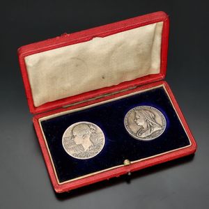 Pair of Silver Medallions in Original Case