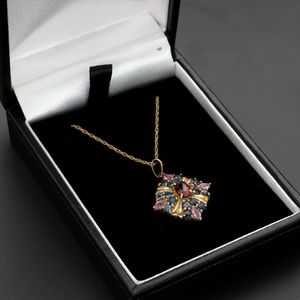 Vintage 9k Gold Garnet and Sapphire Pendant.