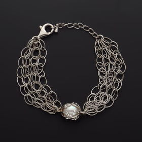 Silver Bracelet With Central Pearl Detail
