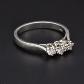 Platinum Ring Set with Three Brilliant-Cut Diamonds