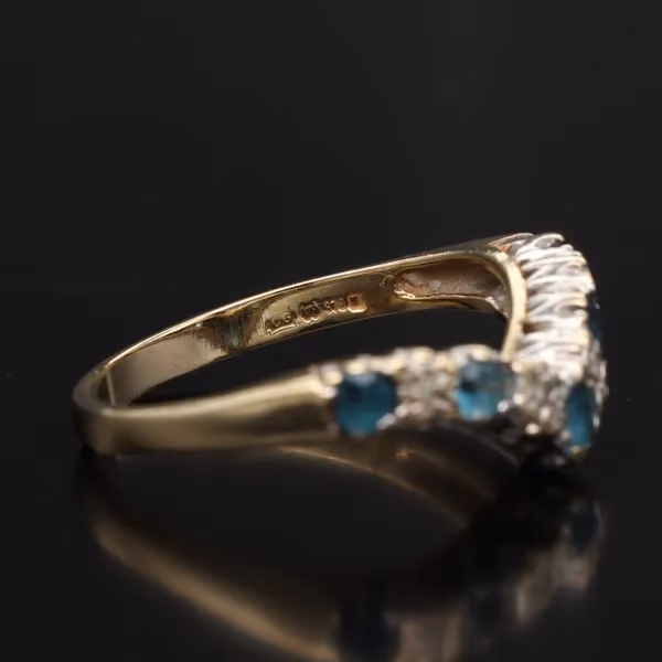 9ct Gold Ring with Five Topaz Gemstones and Four Diamonds