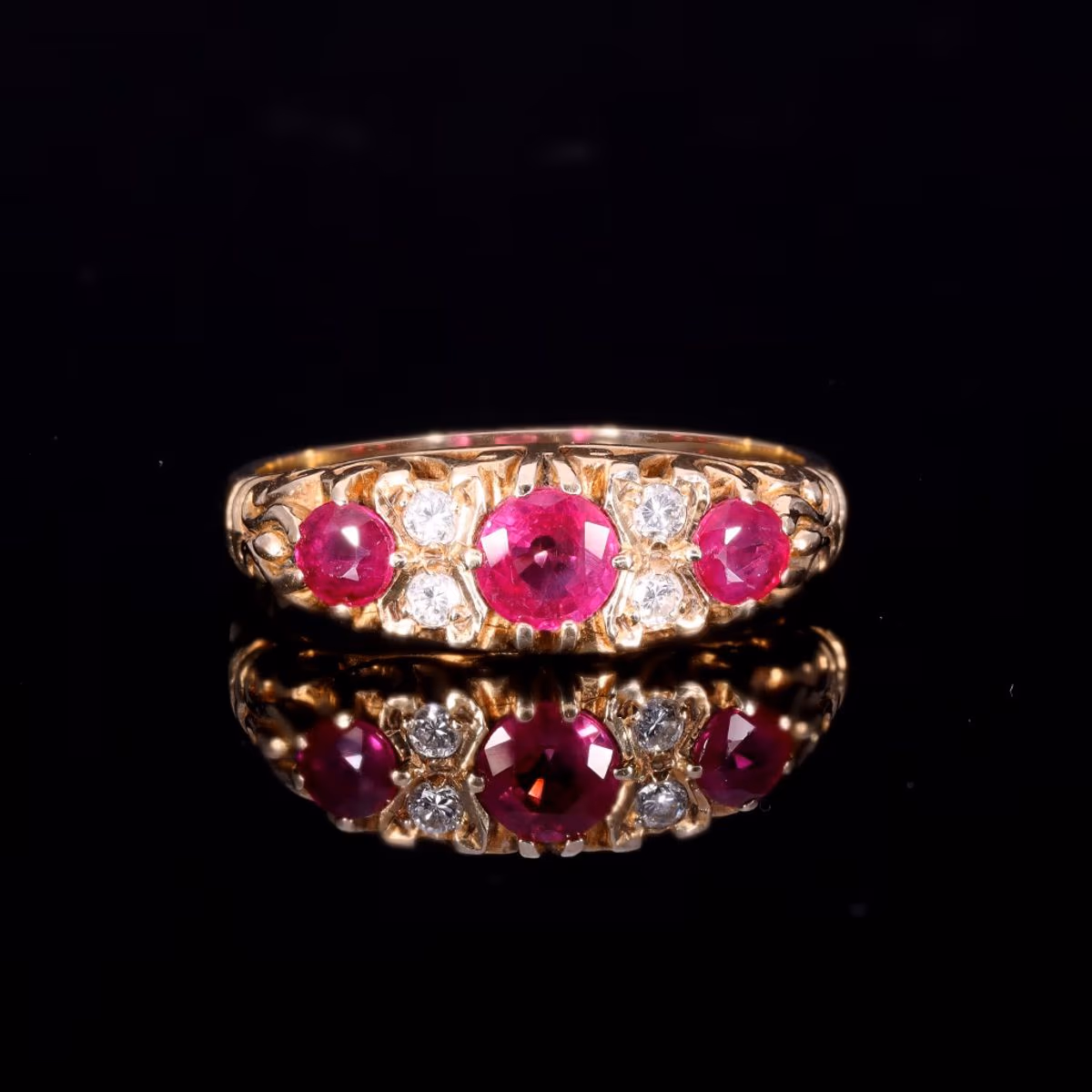 360° view of The Vintage 9ct Gold Three Ruby And Diamond Scrollwork Ring
