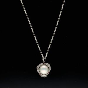 Silver Mabé Pearl and Ruby Pendant