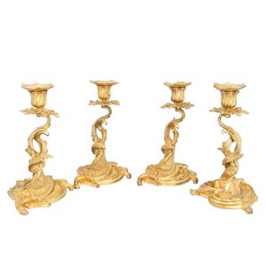 Set of Four French Rococo Gilt Candlesticks