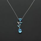18ct Gold Blue Topaz and Diamond Pendant