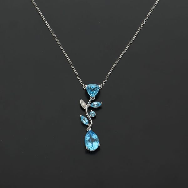 18ct Gold Blue Topaz and Diamond Pendant