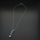 18ct Gold Blue Topaz and Diamond Pendant