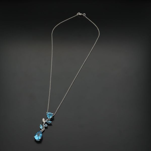 18ct Gold Blue Topaz and Diamond Pendant