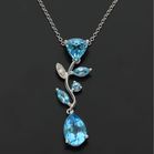 18ct Gold Blue Topaz and Diamond Pendant