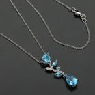 18ct Gold Blue Topaz and Diamond Pendant