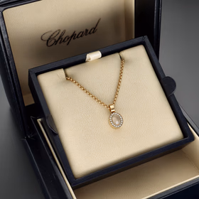 Chopard 'Happy Diamonds' 18ct Yellow Gold & Diamond Oval Pendant with original Box